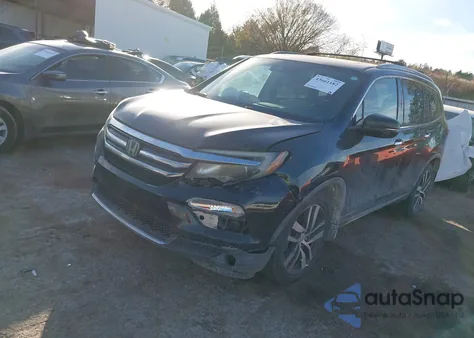 2017 Honda Pilot Touring z USA, uszkodzony, nr VIN 5FNYF5H99HB034243